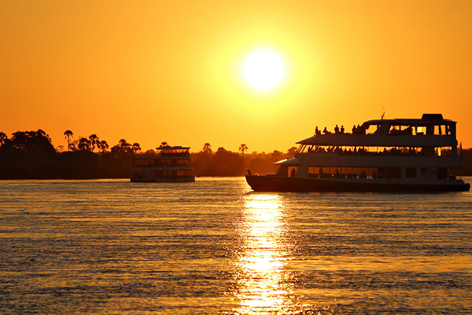 EXPERIENCE THE MAGIC OF AFRICA ON BOARD, OUR LUXURY FLOATING HOTEL, ZAMBEZI QUEEN